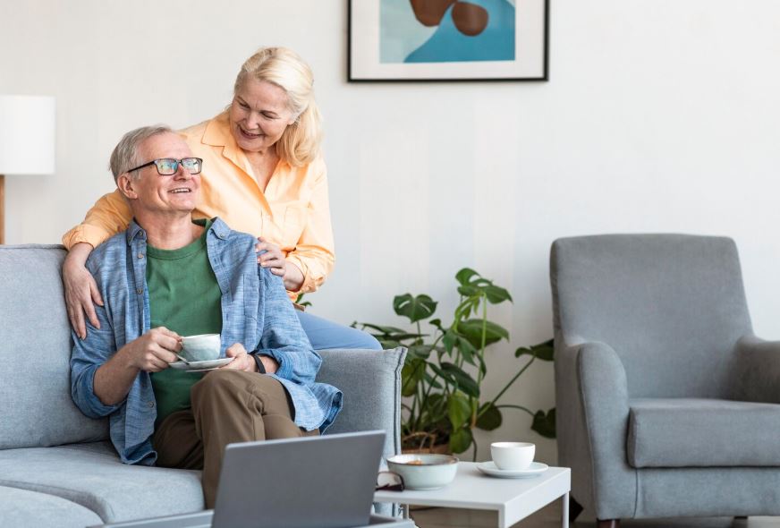 A caregiver helping a senior woman